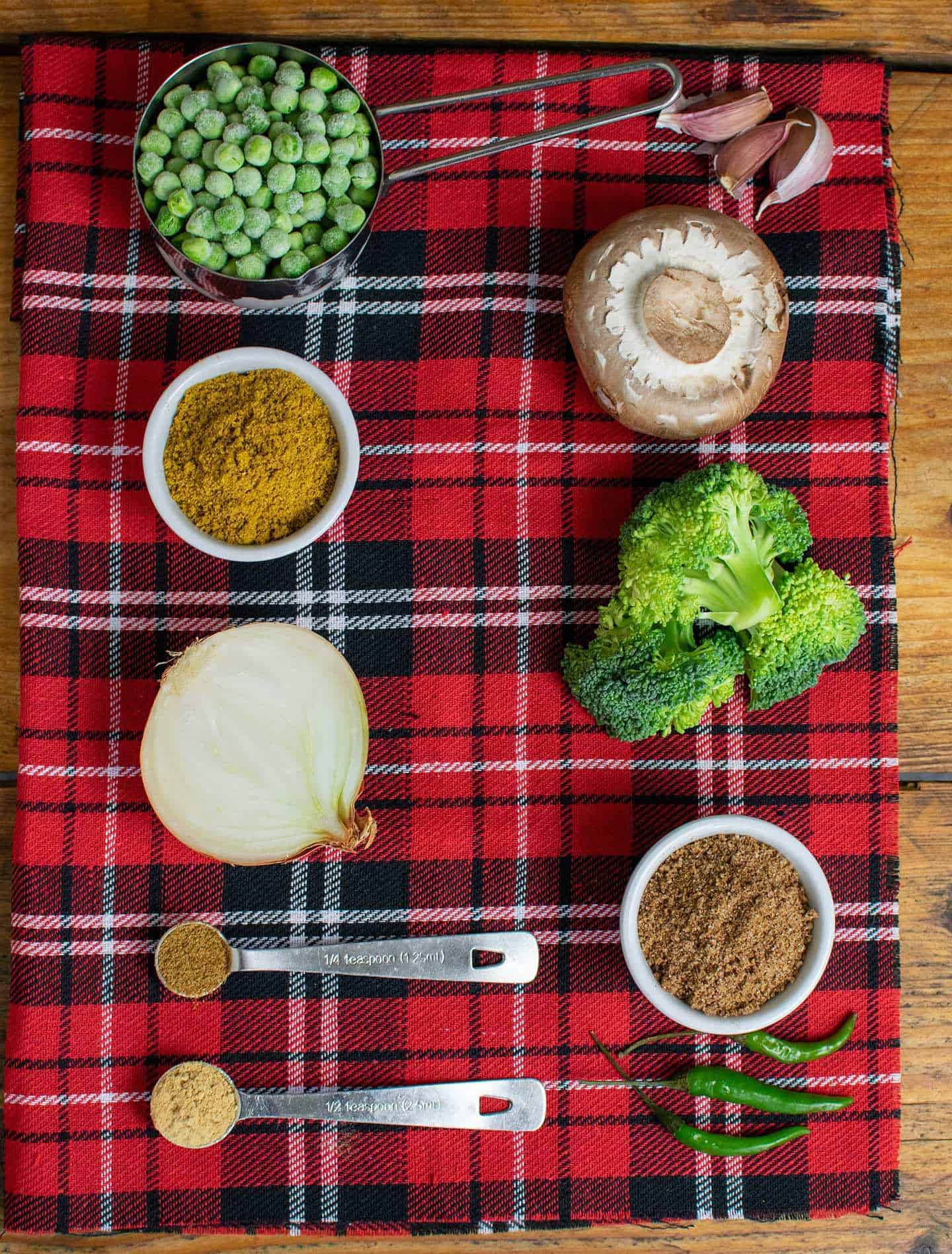 All the fresh ingredients laid out on a red tartan cloth