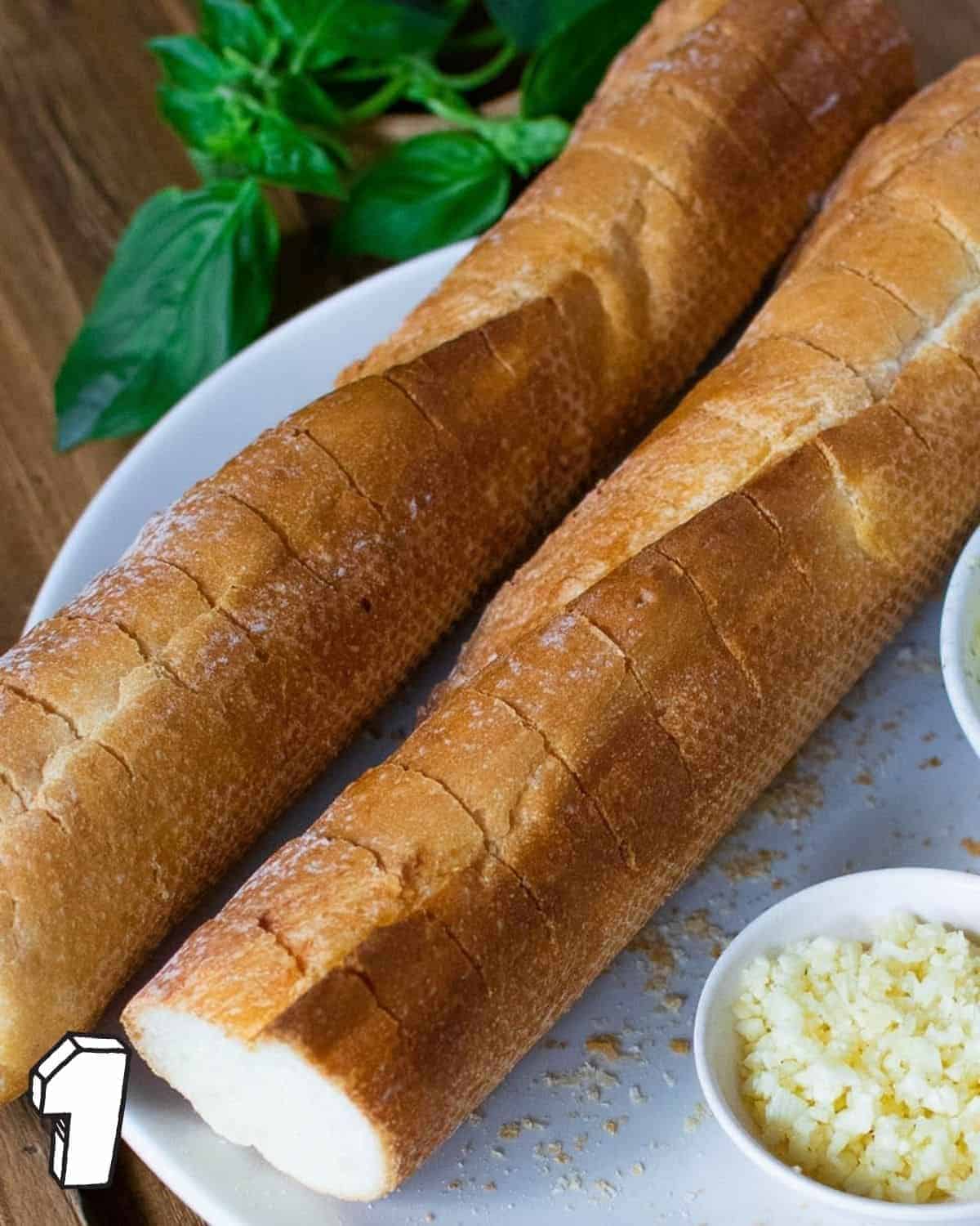 Close up of two sliced baguettes