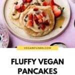 Fluffy vegan pancakes on a plate with a Pinterest title underneath.