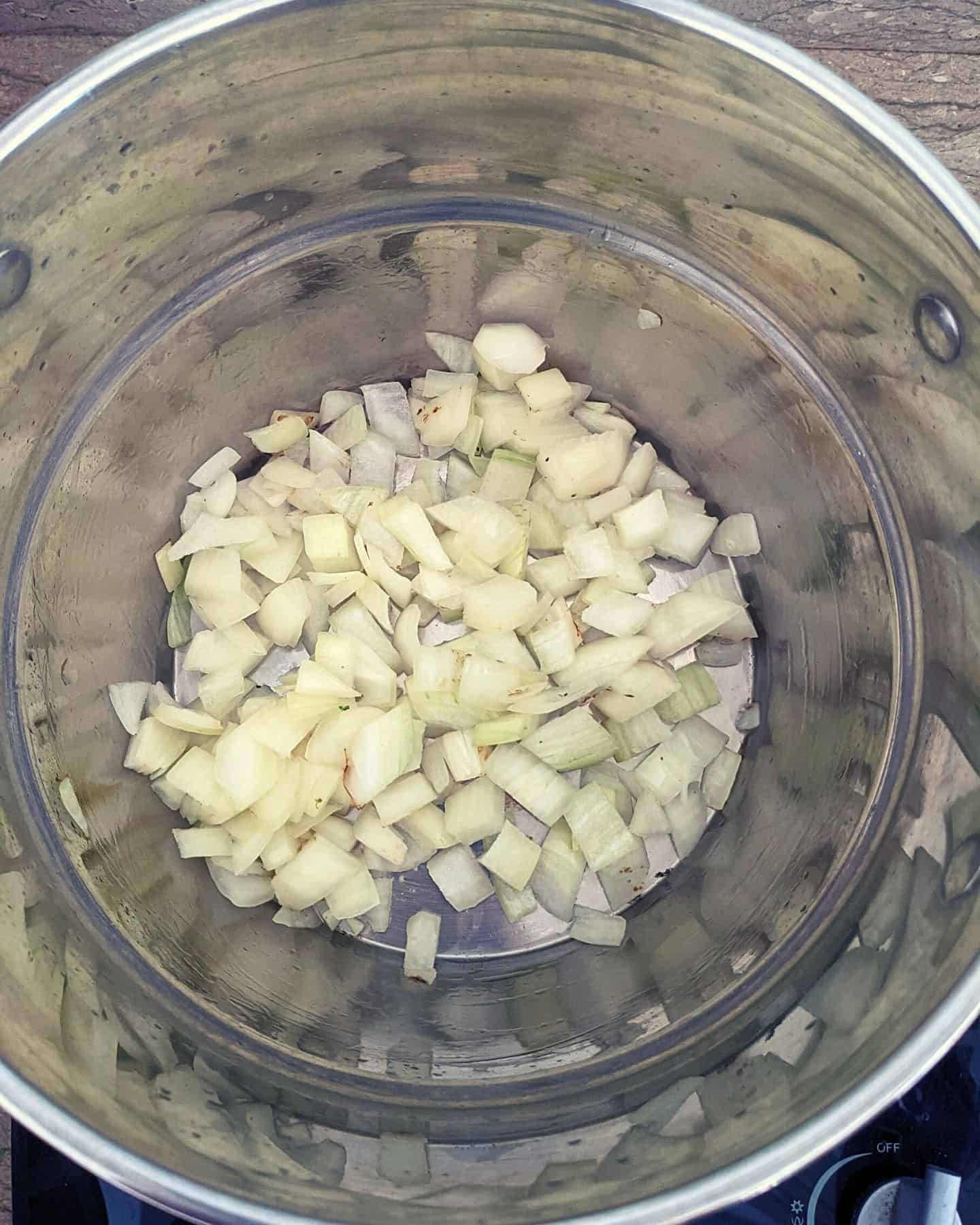 Chopped onions in a deep pan