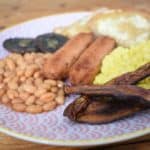 Vegan full English on a pink plate