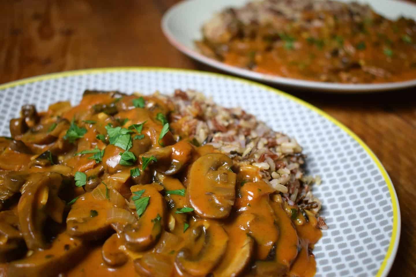 An old photograph of this dish from when we first started blogging, a close up of the food on a grey plate .