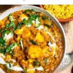 Cauliflower and spinach red lentil curry with a Pinterest title above.