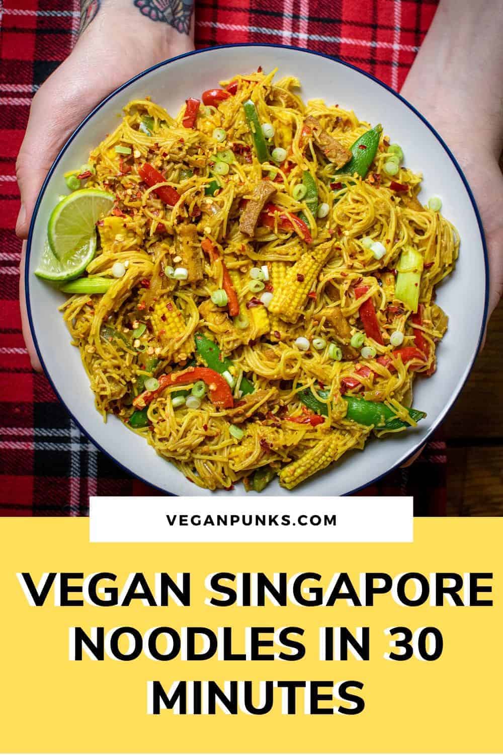 Pinterest image of Singapore Noodles with a yellow band at the bottom for the title