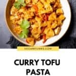 Tofu Curry Pasta in a bowl with a Pinterest title beneath.