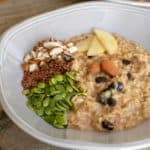 Apple pie porridge in a grey bowl