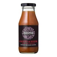 Bottle of Biona stir fry sauce in a glass bottle set to a white background