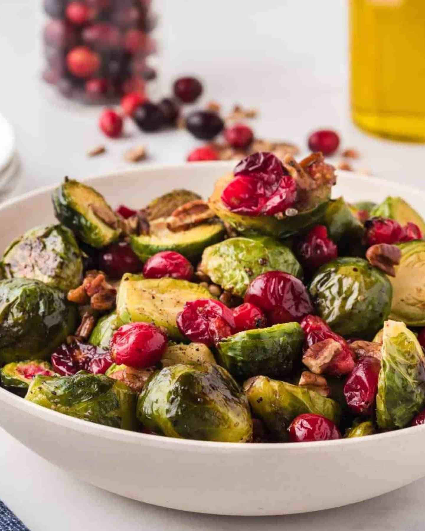 Brussels sprouts with cranberries in a white bowl
