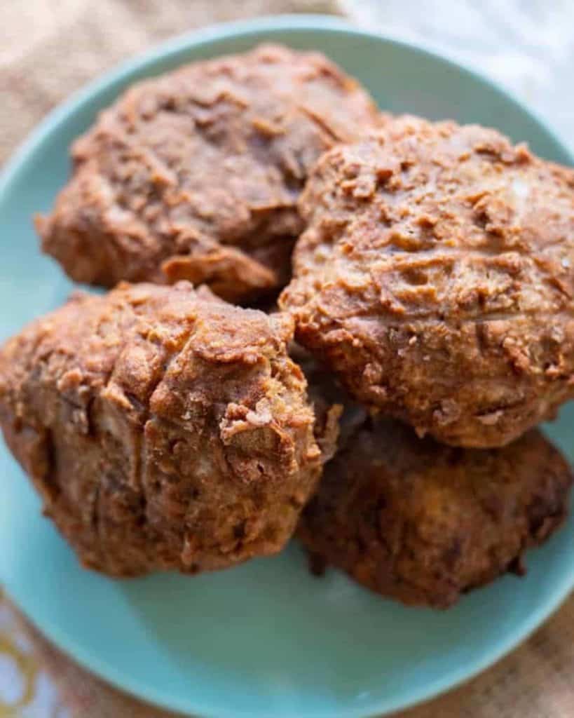 Vegan chicken seitan piled on a blue plate