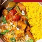 Close up of curry in a bowl with pilau rice, with a Pinterest title above