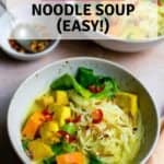 Pinterest image showing khao soi noodle soup with a title above it