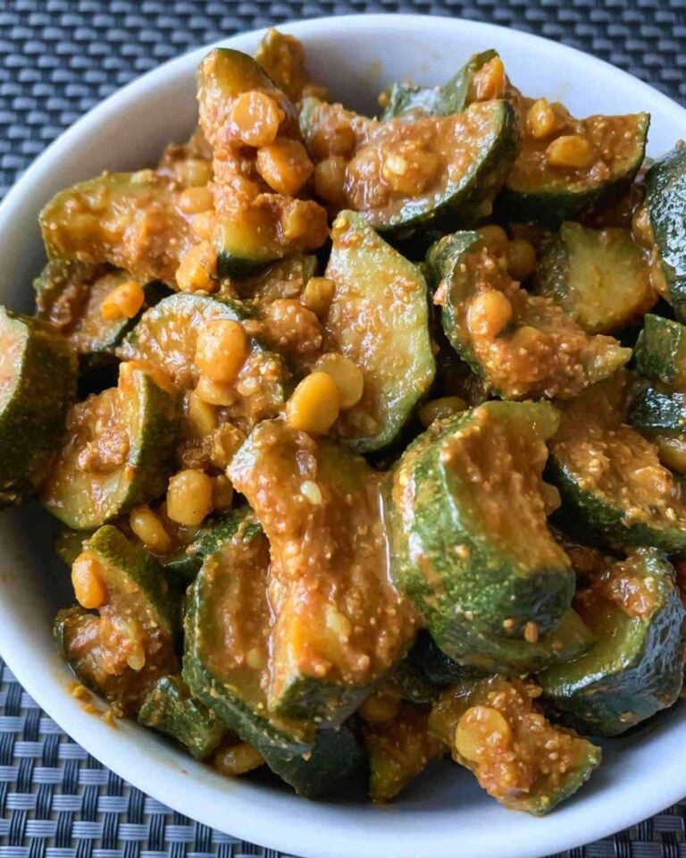 Zucchini and chana dal curry in a bowl.