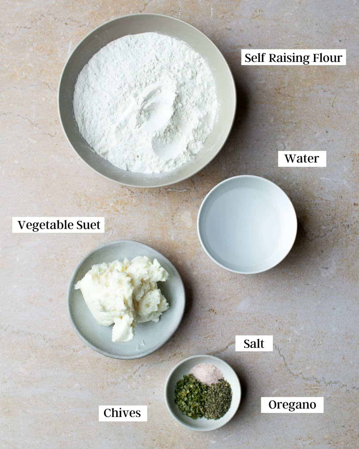 Ingredients in bowls, labelled with text.