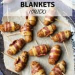 Top down view of vegan pigs in blankets on a plate with a title above the image