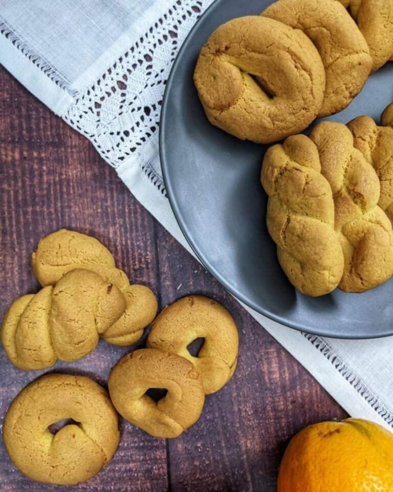 Greek orange cookies on a plate.