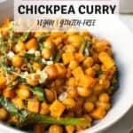 Close up of Jamaican Chickpea Curry with a Pinterest title above it,