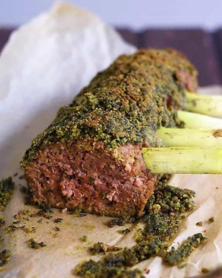 Vegan rack of lamb with a herb crust and fake 'bone' made from leeks.