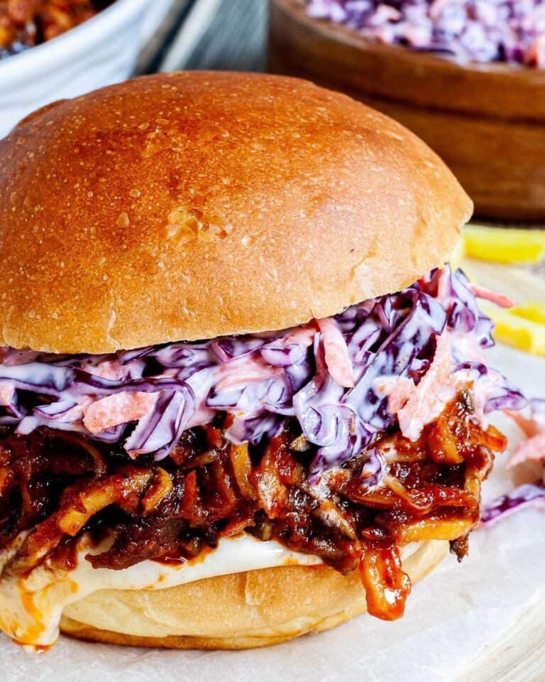 BBQ pulled oyster mushrooms in a bun with coleslaw and mayo.