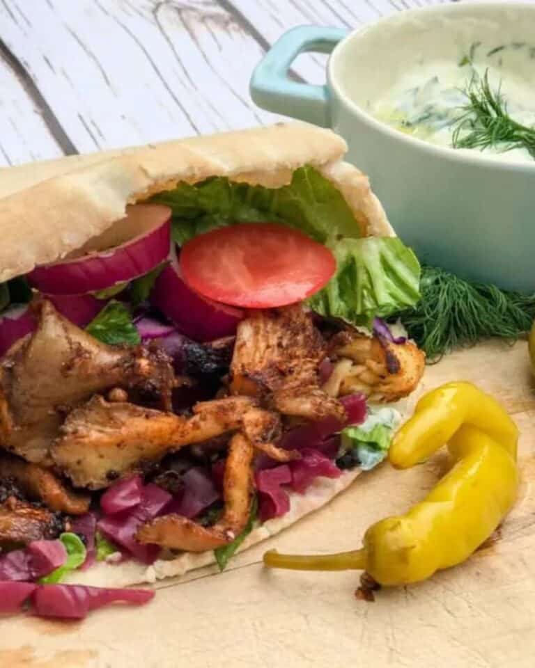 Vegan shawarma in a pitta with tzatziki and a pickled chilli.
