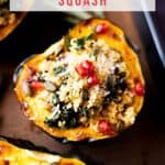 Stuffed acorn squash on a tray with a Pinterest title.