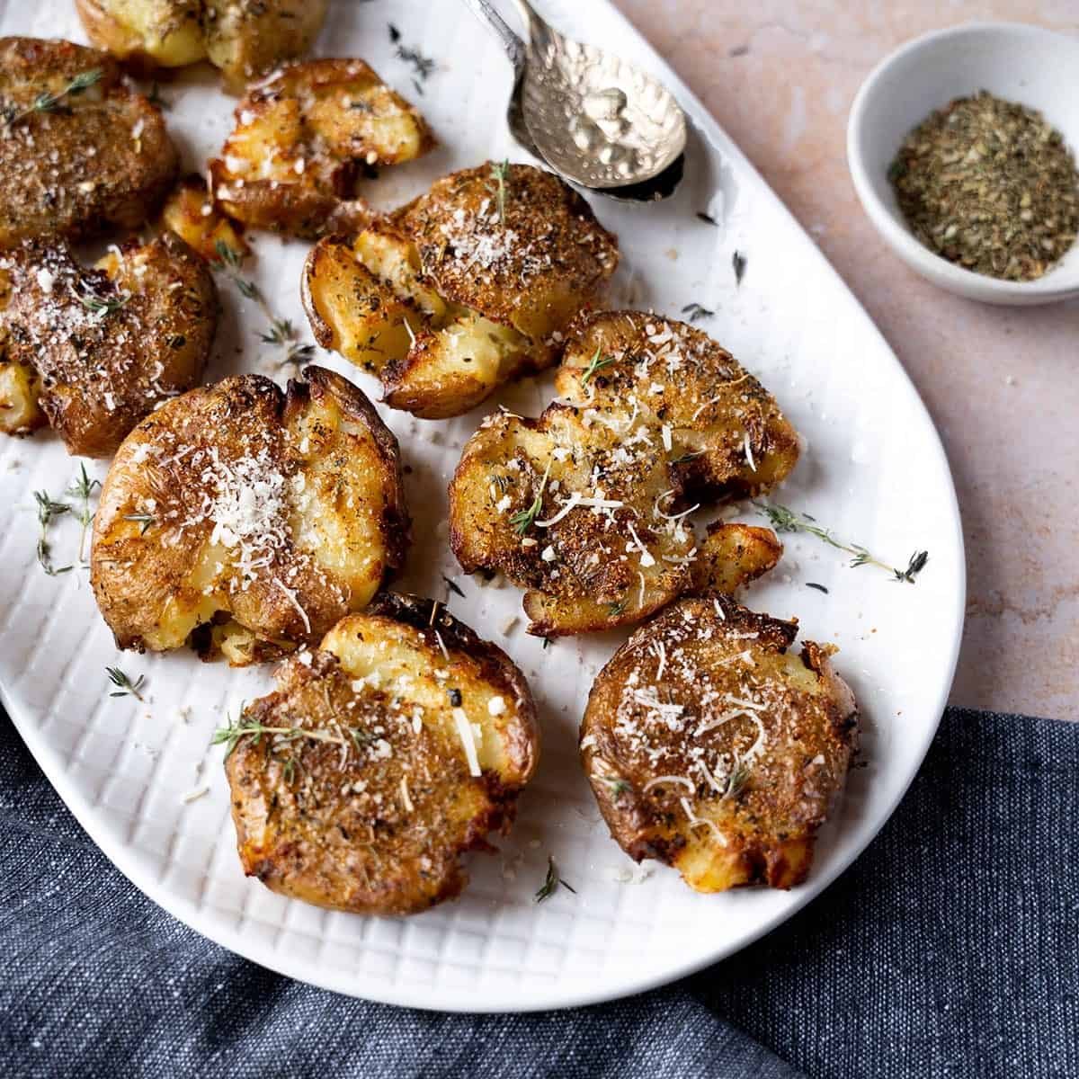 Paprika-Parmesan Smashed Potatoes with Garlic Aioli - Dishing Out