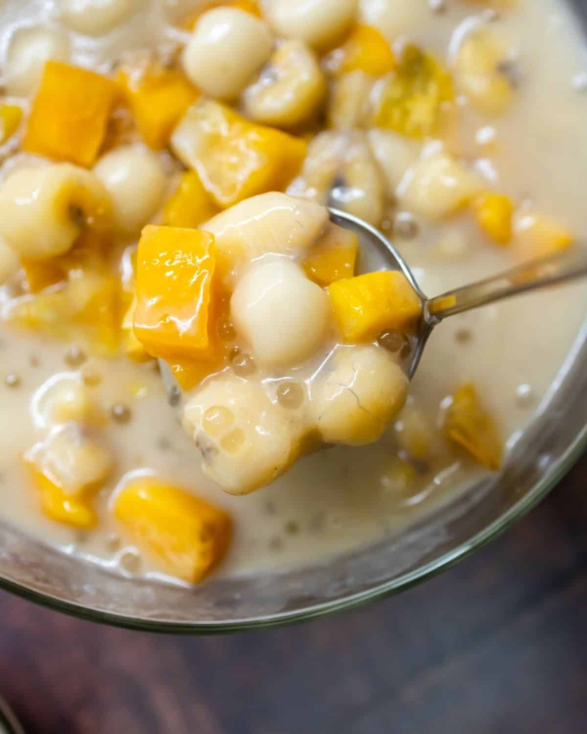 Jackfruit pudding in a bowl with a spoon.