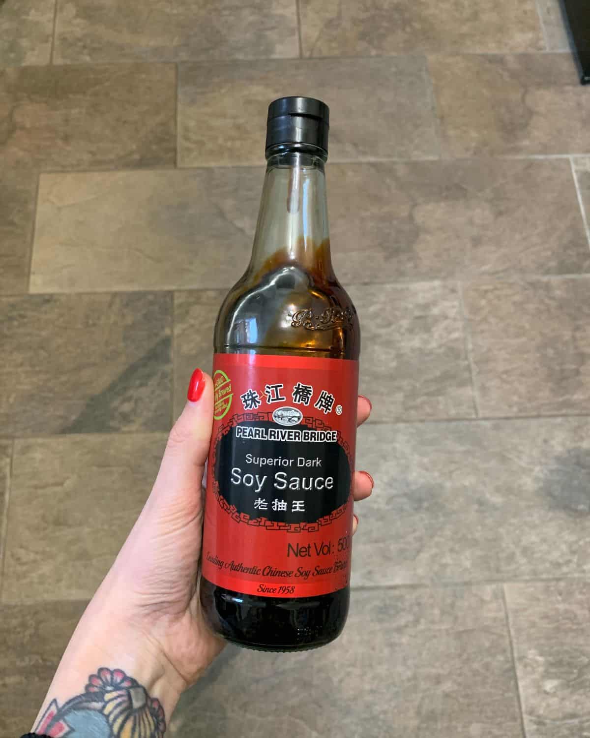 A bottle of Superior Dark Soy Sauce.