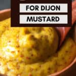 A Pinterest image for dijon mustard with a wooden bowl of dijon.