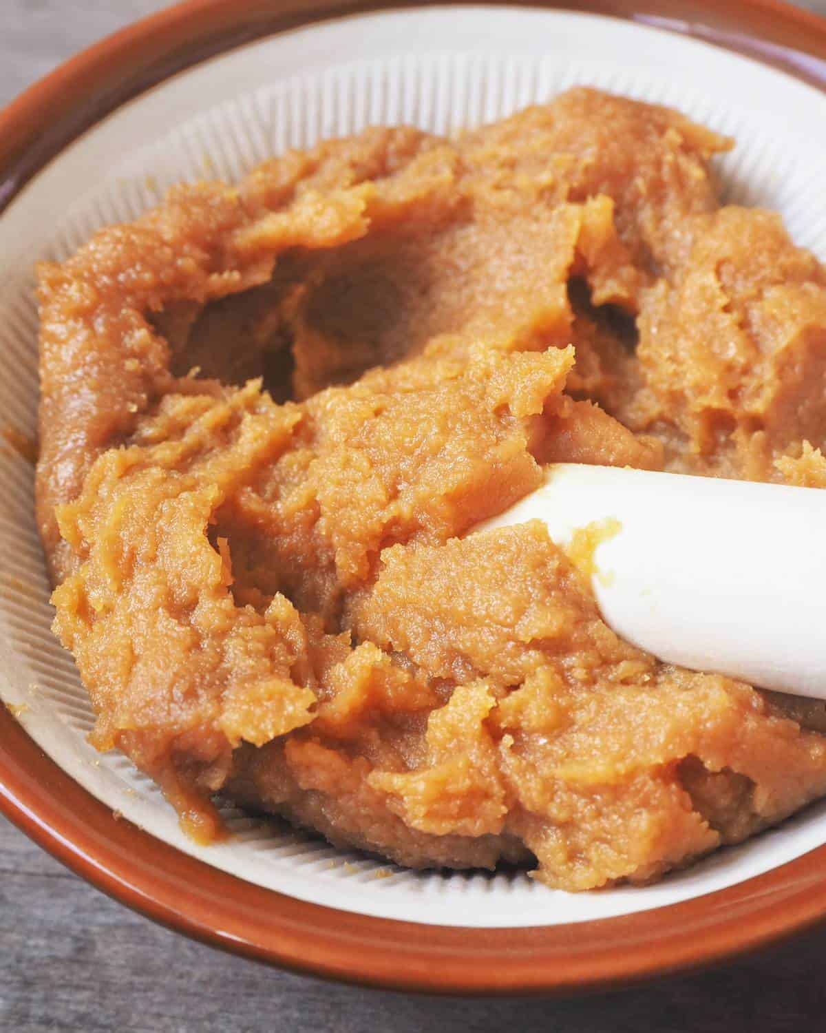 Miso paste in a bowl.