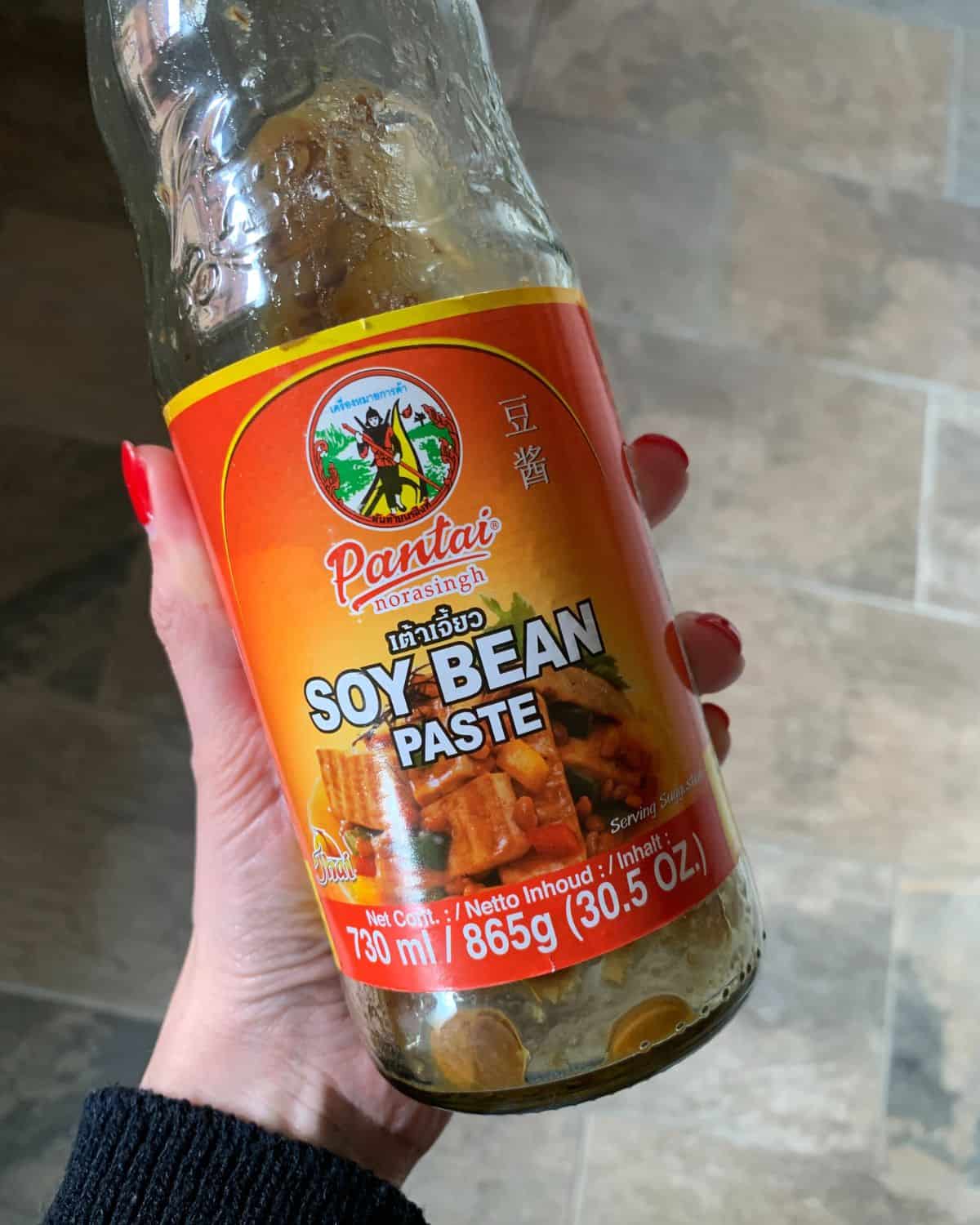 A bottle of soy bean paste.