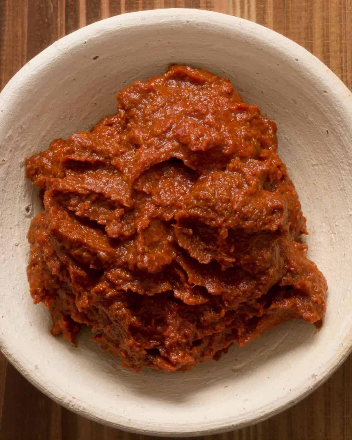 Curry paste in a ceramic bowl.