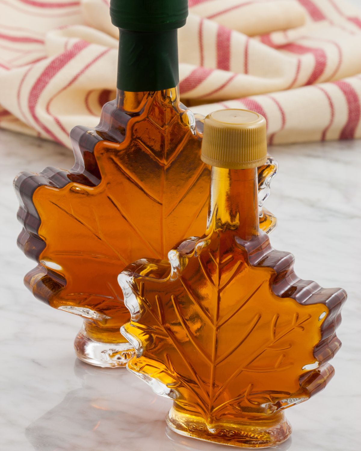 Maple syrup in maple leaf shaped bottles.