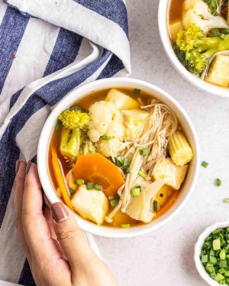 Tofu vegetable soup in a bowl with noodles.